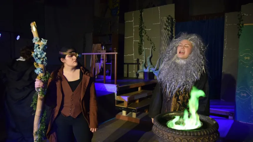 Two students performing in a play