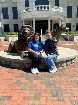Kayla Alves and Sarah McFarland at the Pride statue