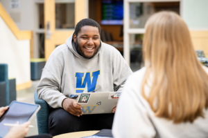 Widener University business students socialize.