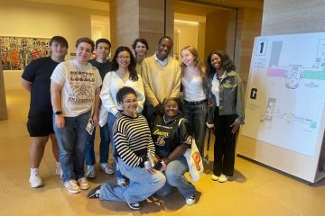 honors program students 960x640 10 students huddled together in a museum smiling for the camera