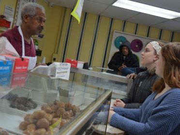 Students buy doughnuts at Phatso's Bakery