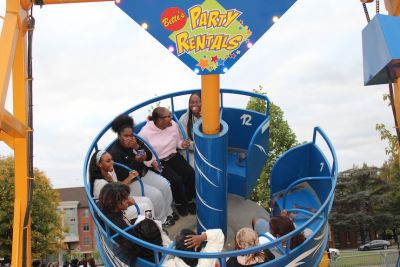 Students on a ride at Widener's Homecoming Carnival. 