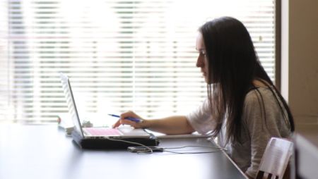 Student Studying at Table
