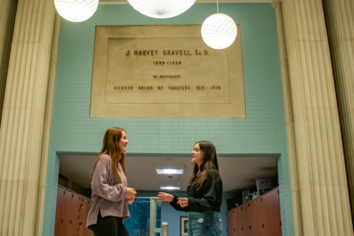 experience more students talking 960x640 Students Emma Lavin and Saleeth Ulloa Lasso talking in hallway of Kapelski Learning Center
